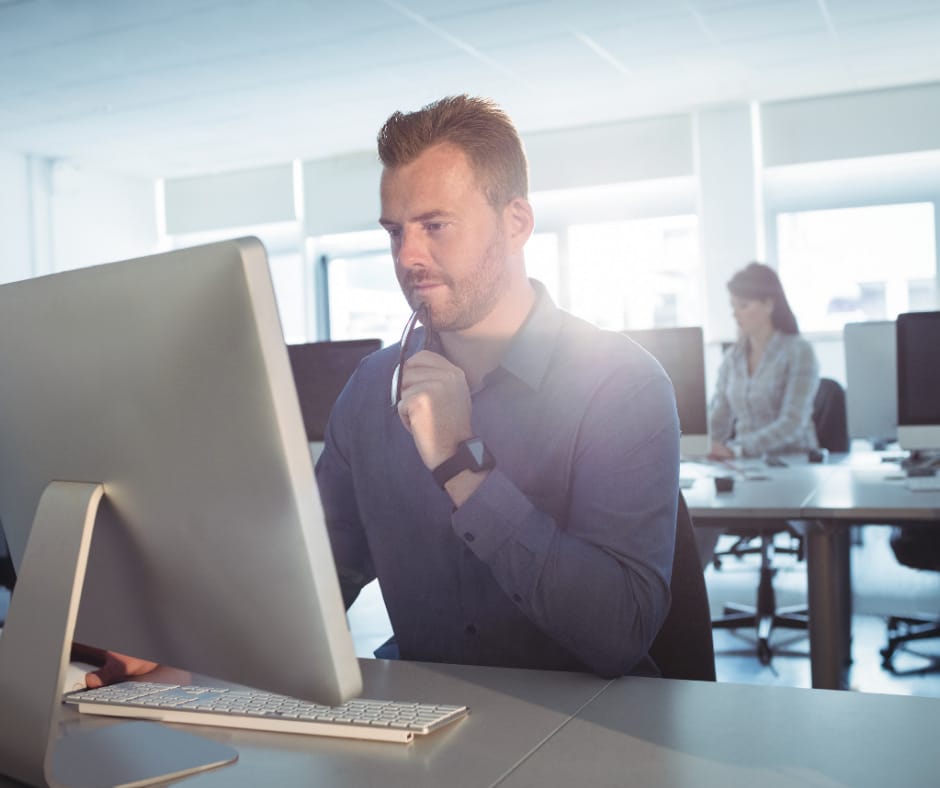 Man at computer Choosing the right cloud provider